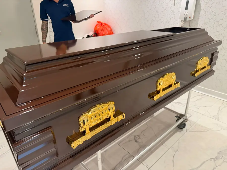 Repatriation coffin with gold fittings